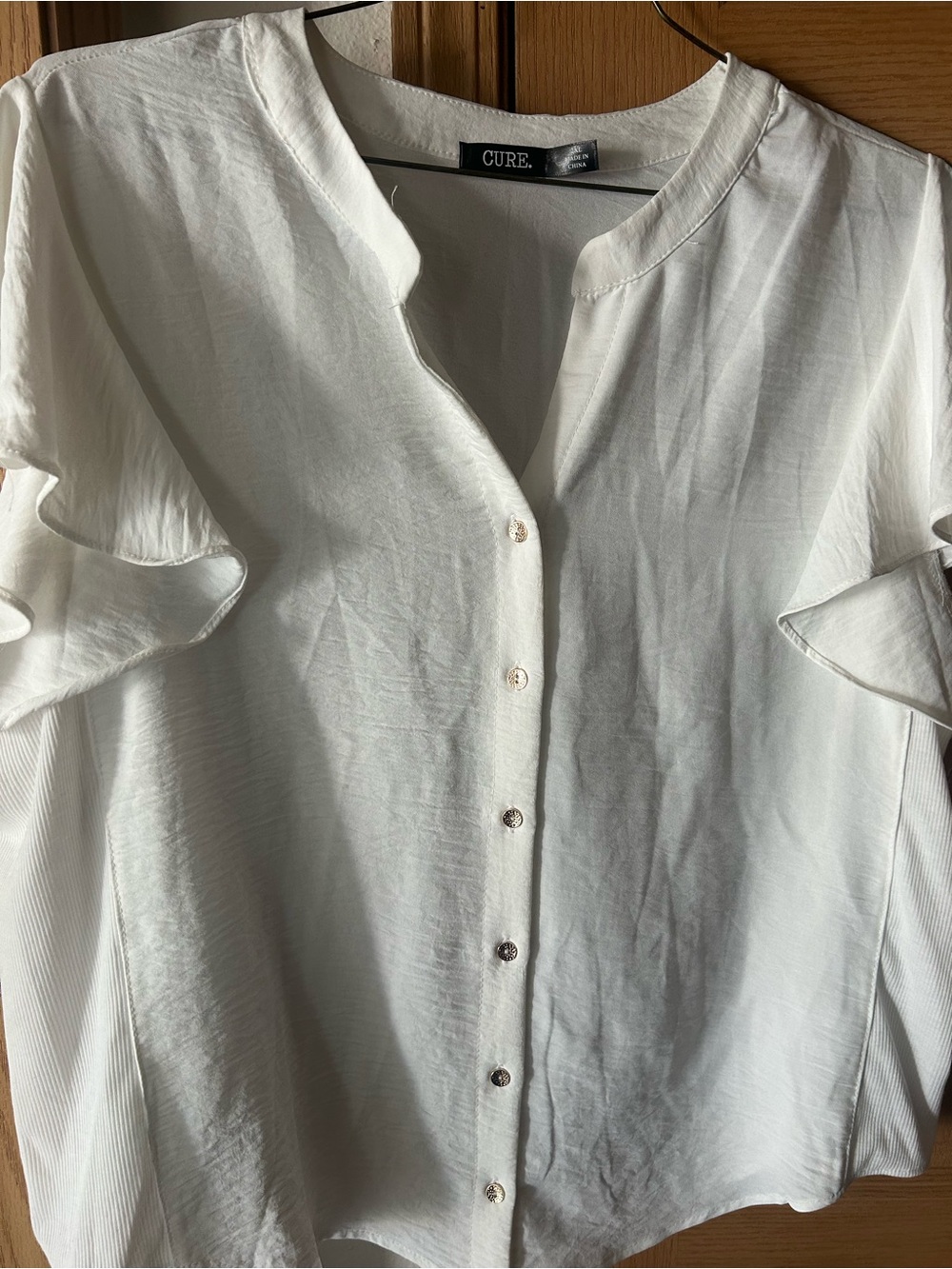 CURE. White Button-Up Blouse